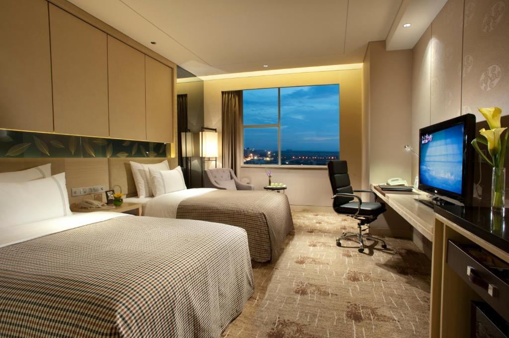 Grand Skylight International Hotel Ganzhou Chang Zhen Avenue Quarto foto